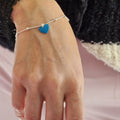 PULSERA BOLITAS CON COLGANTE CORAZÓN