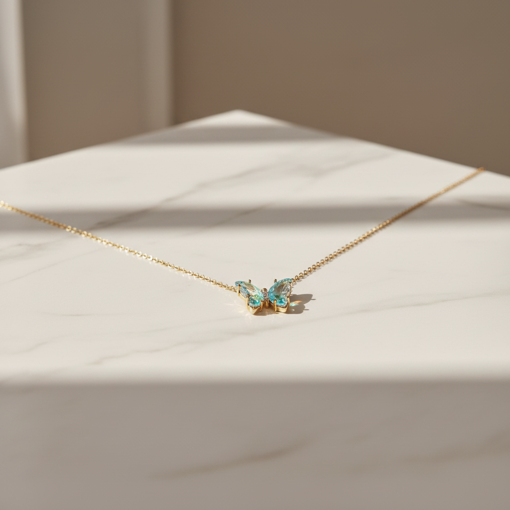 COLLAR ACERO DORADO MARIPOSA CRISTAL
