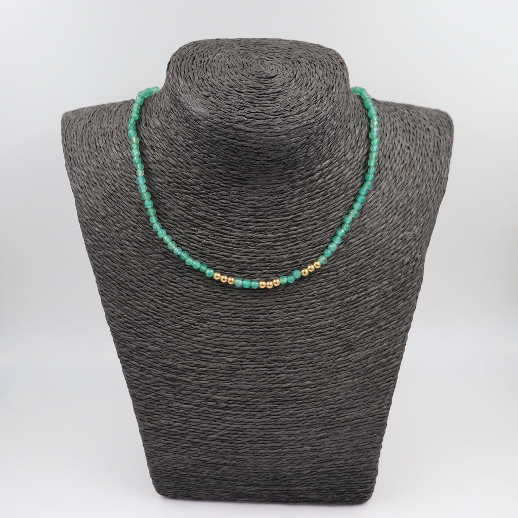 COLLAR ACERO DORADO Y PIEDRAS VERDES