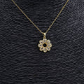 COLLAR ACERO DORADO Y FLOR CON CIRCONITAS