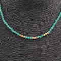 COLLAR ACERO DORADO Y PIEDRAS VERDES