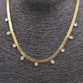COLLAR ACERO DORADO PLANO Y CIRCONITAS