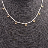COLLAR ACERO DORADO PERLITAS Y ESTRELLAS
