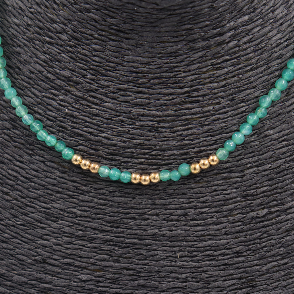 COLLAR ACERO DORADO Y PIEDRAS VERDES